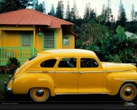 美国国家地理图片:夏威夷拉奈市的黄色小屋，起初这种色彩鲜艳的小屋是为菠萝种植园的工人建造的