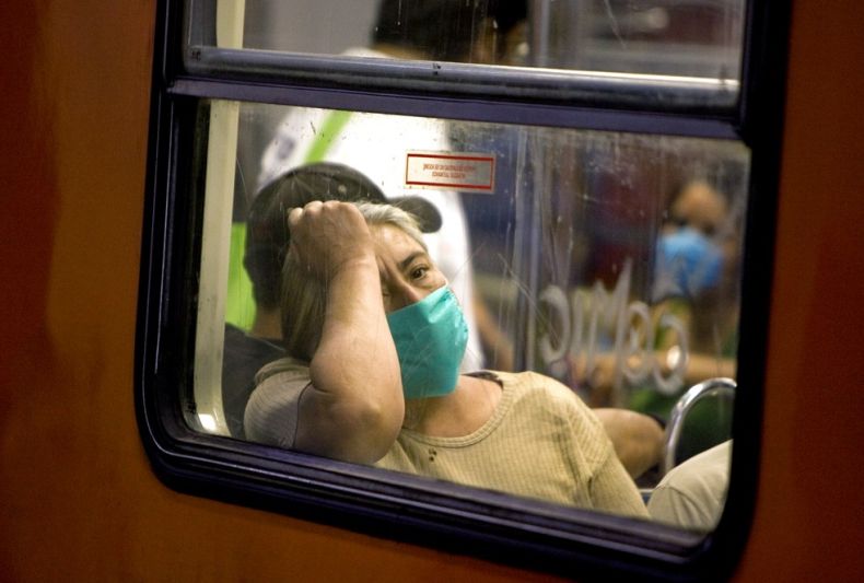 摄影图片：H1N1遮住了全世界的脸庞