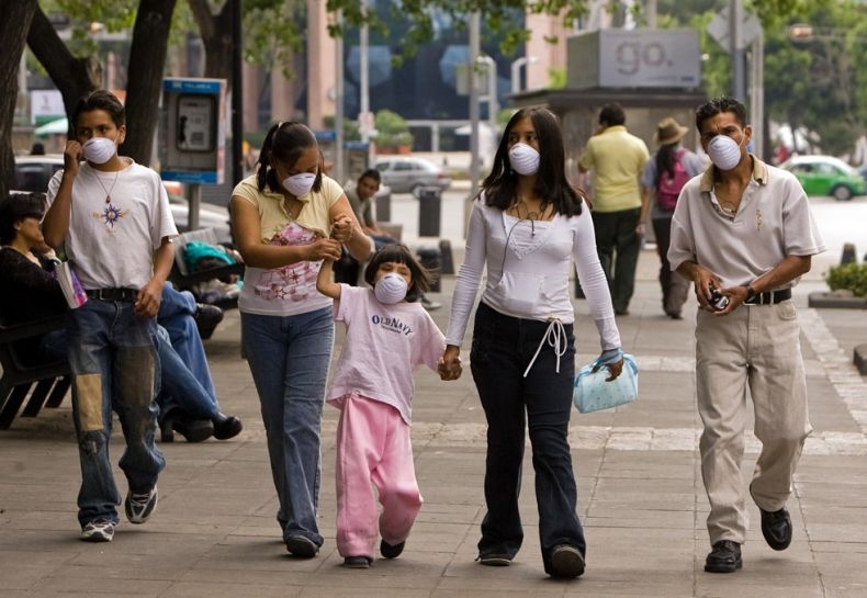 摄影图片：H1N1遮住了全世界的脸庞