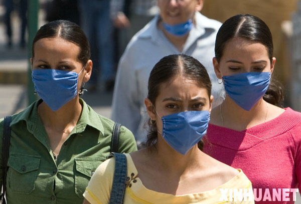 摄影图片：H1N1遮住了全世界的脸庞